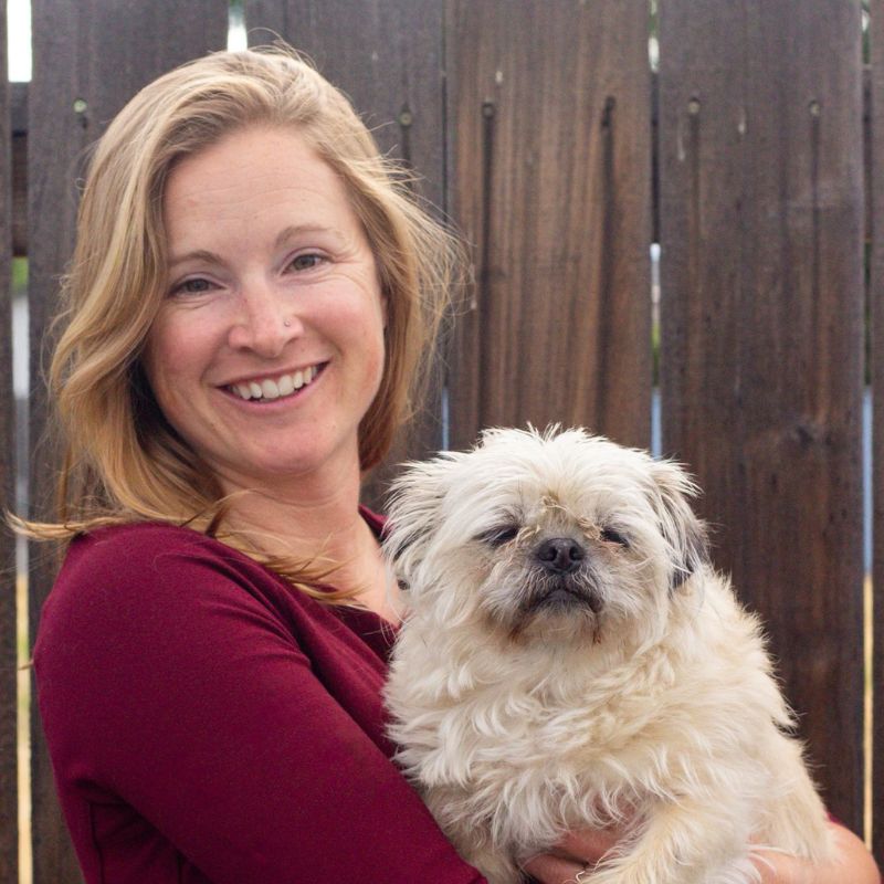 Dr. Nicki Leonard holding a dog